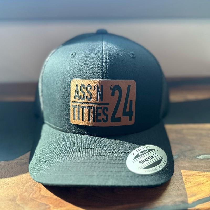 A** & Ti**Es Trucker Hat * Free Koozie